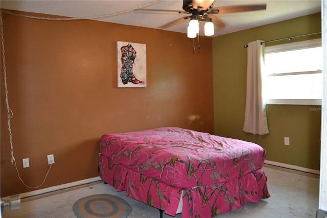 21161 Knollwood Ave, Port Charlotte, FL 33952 - bedroom featuring baseboards and ceiling fan