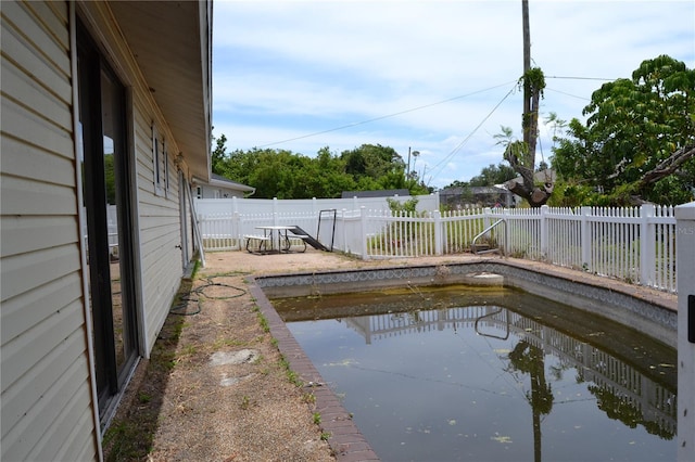 21161 Knollwood Ave, Port Charlotte, FL 33952 - view of swimming pool featuring a fenced backyard