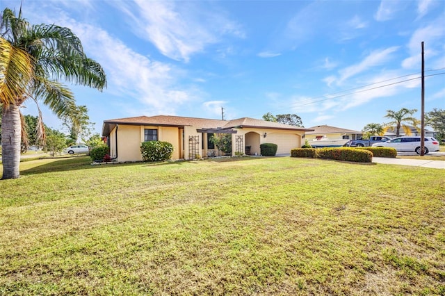 view of front of house featuring an attached garage, stucco siding, driveway, and a front yard