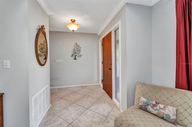 hallway featuring visible vents, ornamental molding, and light tile patterned floors