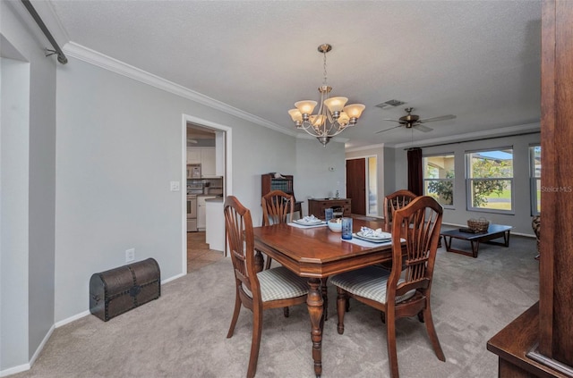 dining space featuring visible vents, crown molding, a chandelier, and light carpet