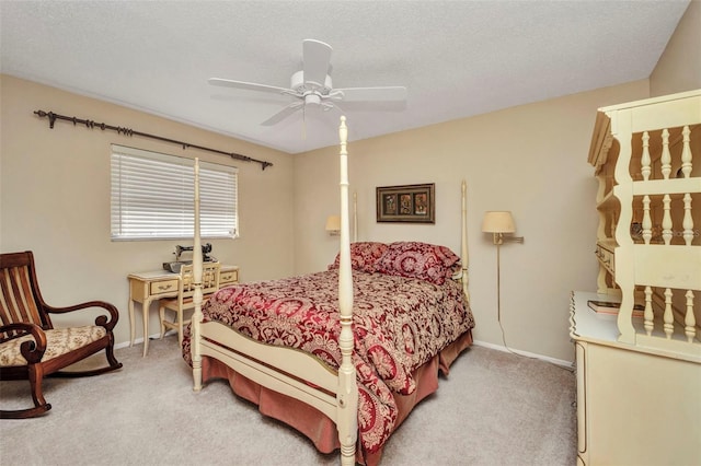 bedroom with baseboards, light carpet, and a ceiling fan