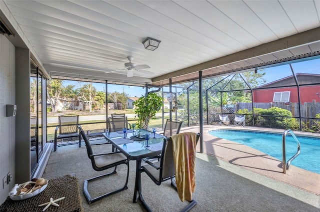 pool featuring a patio, ceiling fan, fence, and a lanai