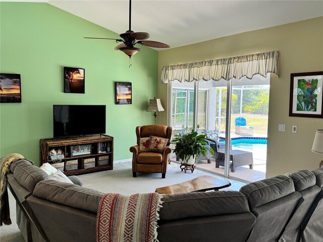 1025 Boundary Blvd, Rotonda West, FL 33947 - carpeted living room featuring baseboards and ceiling fan