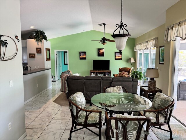 1025 Boundary Blvd, Rotonda West, FL 33947 - dining area with a ceiling fan, visible vents, baseboards, marble finish floor, and lofted ceiling