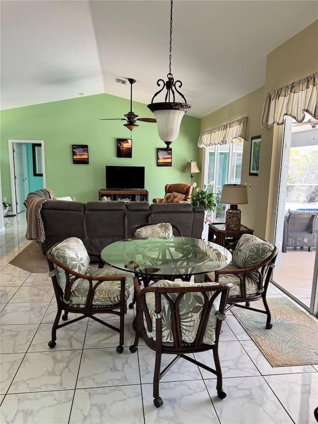 1025 Boundary Blvd, Rotonda West, FL 33947 - dining space with visible vents, a ceiling fan, lofted ceiling, and marble finish floor