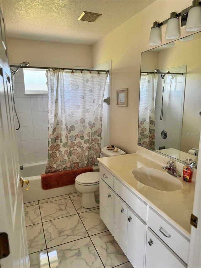 1025 Boundary Blvd, Rotonda West, FL 33947 - bathroom featuring visible vents, shower / bath combo with shower curtain, marble finish floor, vanity, and toilet