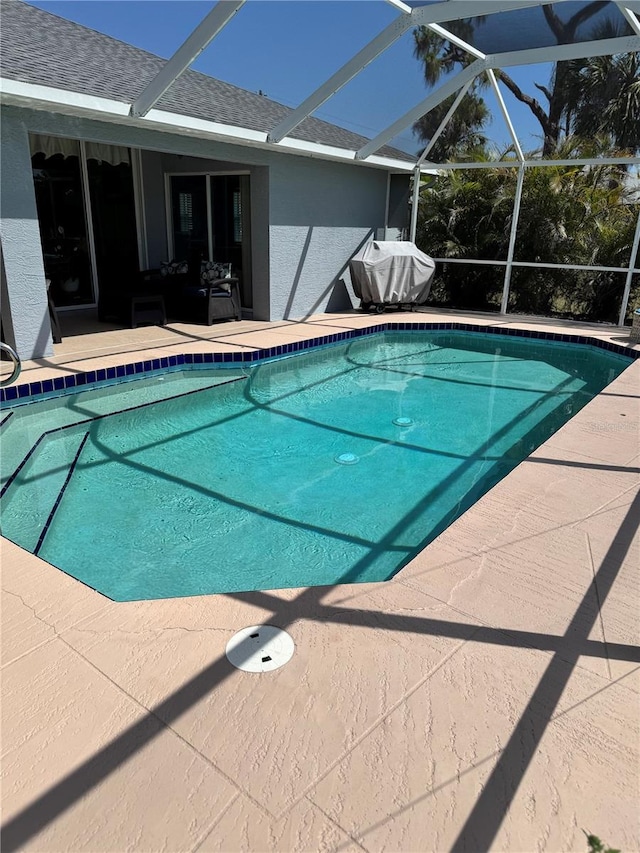 1025 Boundary Blvd, Rotonda West, FL 33947 - outdoor pool with grilling area, a lanai, and a patio area