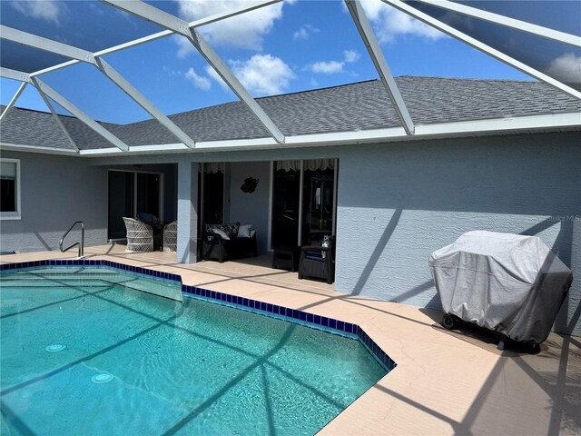 1025 Boundary Blvd, Rotonda West, FL 33947 - pool with glass enclosure, a patio, and area for grilling