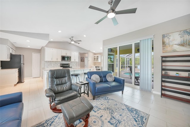 living area with a ceiling fan, lofted ceiling, baseboards, light tile patterned flooring, and recessed lighting