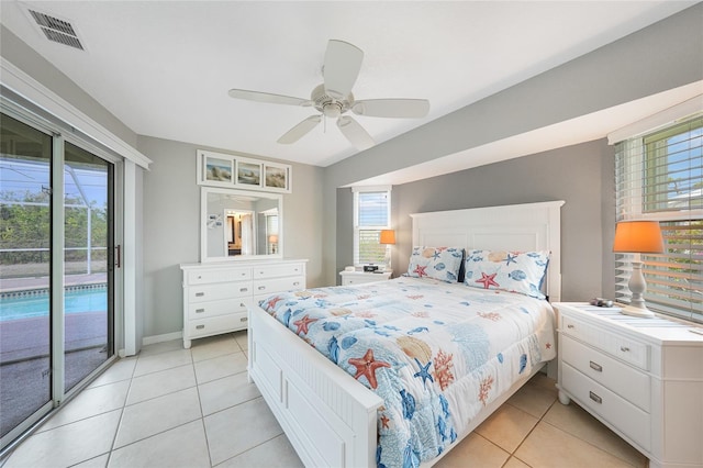 bedroom featuring light tile patterned floors, access to outside, a ceiling fan, and baseboards
