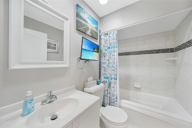 full bathroom featuring toilet, shower / bath combo with shower curtain, vanity, and a textured wall