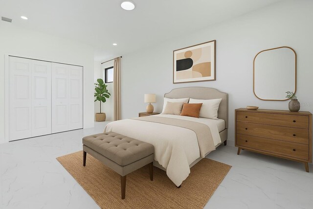 bedroom with recessed lighting, visible vents, marble finish floor, and a closet