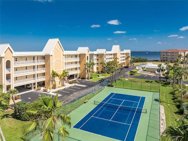 view of sport court featuring fence