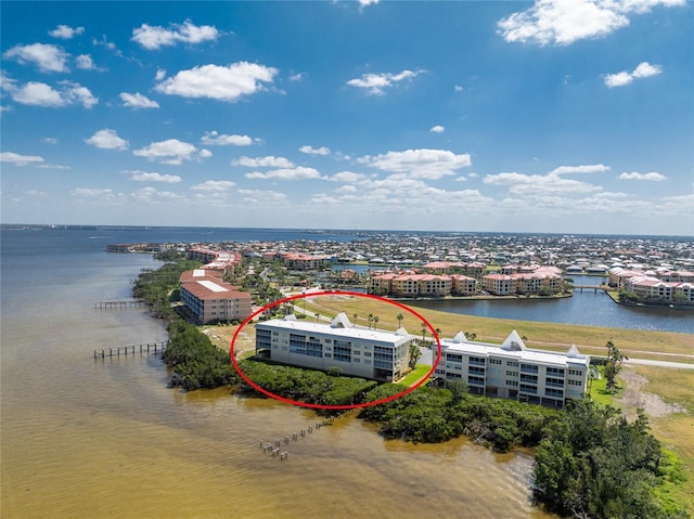 bird's eye view with a water view