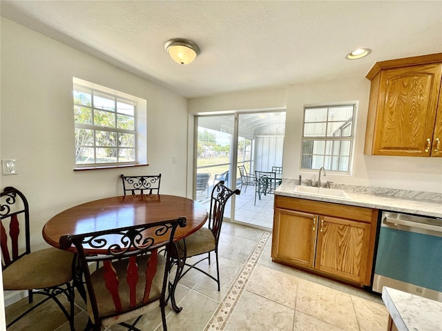 dining room with light tile patterned floors and recessed lighting