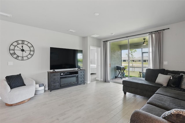 16079 Bandermill Dr, Port Charlotte, FL 33953 - living area with light wood-style flooring