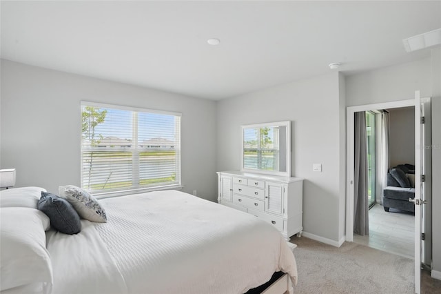 16079 Bandermill Dr, Port Charlotte, FL 33953 - bedroom featuring light colored carpet and baseboards
