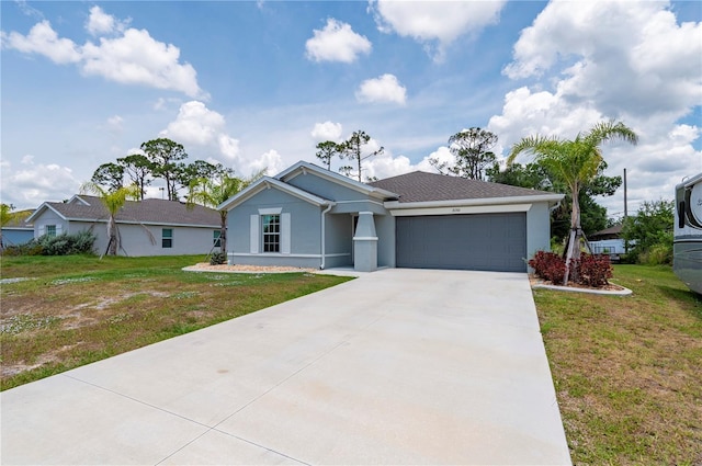 ranch-style house featuring an attached garage, driveway, stucco siding, and a front yard