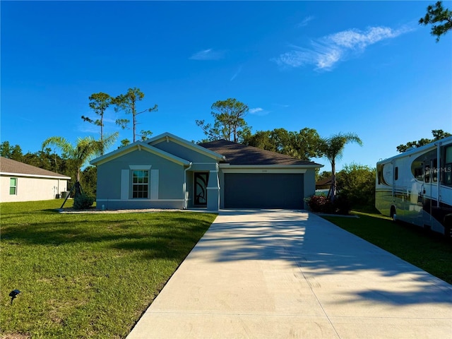 21310 Quesada Ave, Port Charlotte, FL 33952 - view of front facade with driveway, an attached garage, a front yard, and stucco siding
