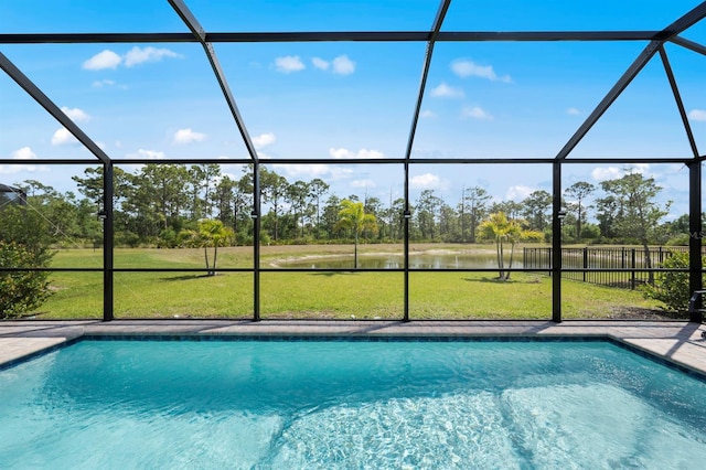 16016 Shoebutton Ct, North Fort Myers, FL 33917 - outdoor pool with a water view, a lanai, and a yard
