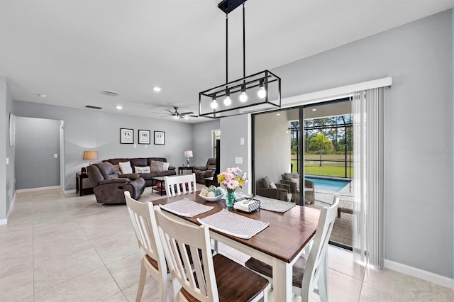 16016 Shoebutton Ct, North Fort Myers, FL 33917 - dining space with a ceiling fan, baseboards, recessed lighting, light tile patterned floors, and visible vents