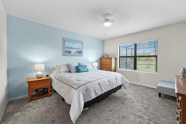 16016 Shoebutton Ct, North Fort Myers, FL 33917 - carpeted bedroom featuring a ceiling fan and baseboards