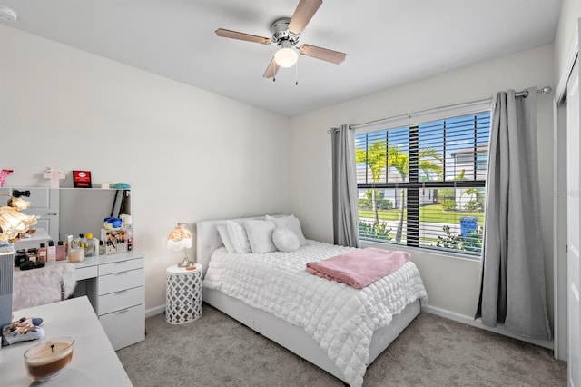 16016 Shoebutton Ct, North Fort Myers, FL 33917 - bedroom featuring carpet floors, a ceiling fan, and baseboards