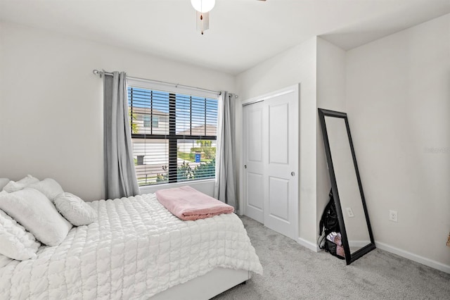 16016 Shoebutton Ct, North Fort Myers, FL 33917 - bedroom with carpet flooring, baseboards, and a closet