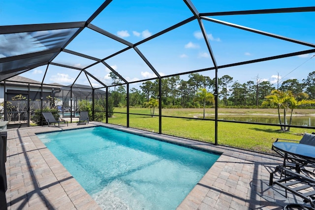 16016 Shoebutton Ct, North Fort Myers, FL 33917 - outdoor pool featuring a water view, a patio area, a lanai, and a yard