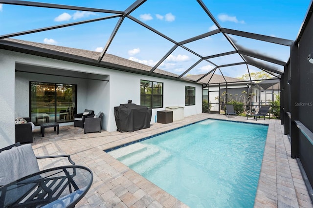 16016 Shoebutton Ct, North Fort Myers, FL 33917 - outdoor pool featuring grilling area and a patio area