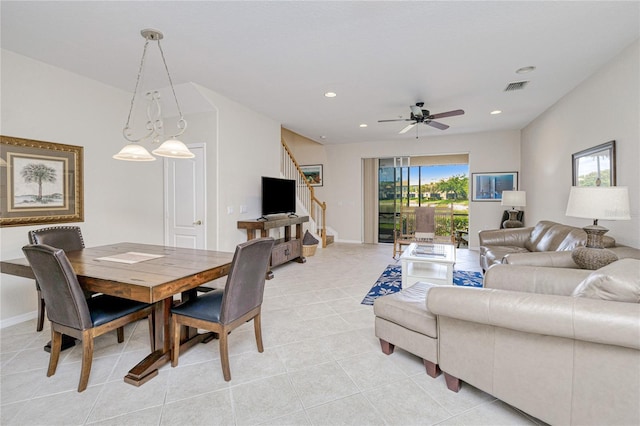 living area with stairs, light tile patterned floors, ceiling fan, recessed lighting, and baseboards