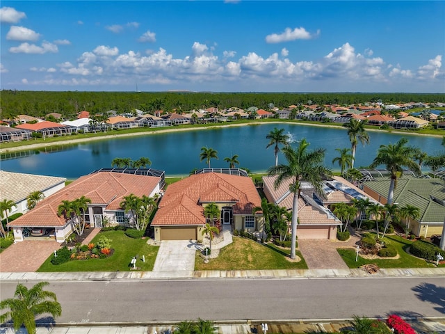 aerial view of residential area with a large body of water