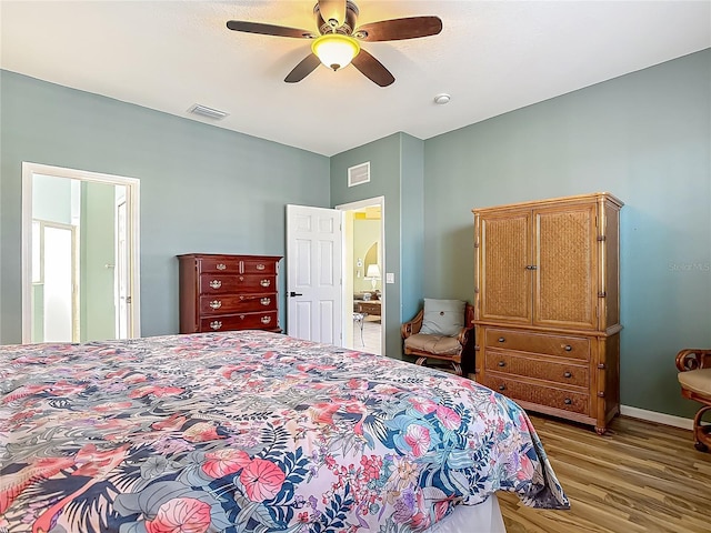bedroom with light wood-style floors and ceiling fan