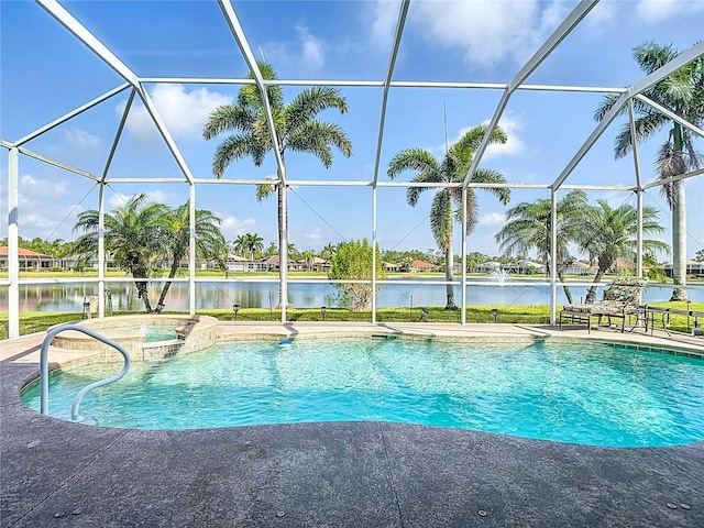 view of swimming pool featuring a patio, a water view, a pool with connected hot tub, and glass enclosure