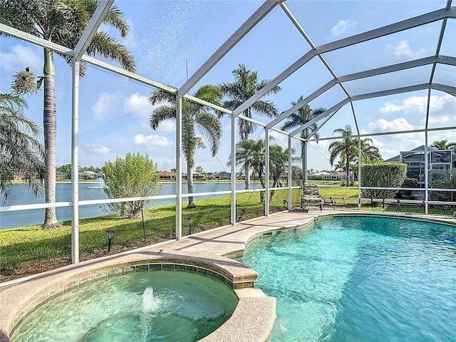 view of pool with a water view, a yard, and a lanai