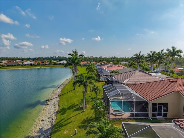 aerial view of residential area with a large body of water