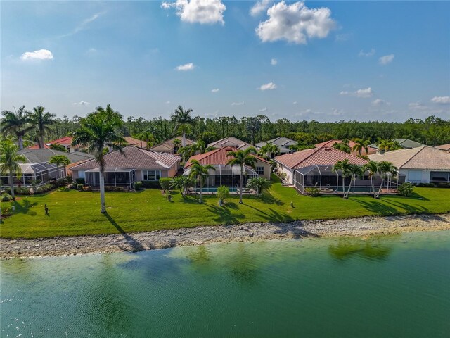 aerial perspective of suburban area with a large body of water