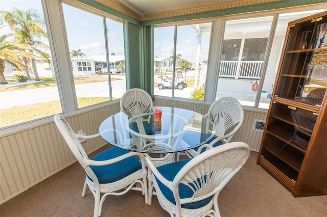 643 Blackburn Blvd, North Port, FL 34287 - sunroom with carpet, healthy amount of natural light, and outdoor dining space