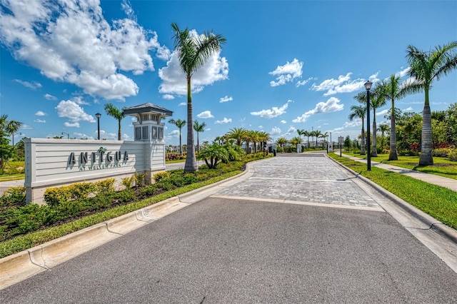 10995 Pinot Dr, Venice, FL 34293 - view of road featuring street lighting, curbs, and sidewalks