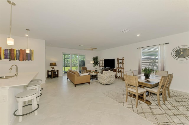 10995 Pinot Dr, Venice, FL 34293 - dining space featuring baseboards, recessed lighting, and light tile patterned flooring