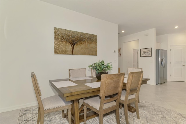 10995 Pinot Dr, Venice, FL 34293 - dining space with light tile patterned flooring and recessed lighting