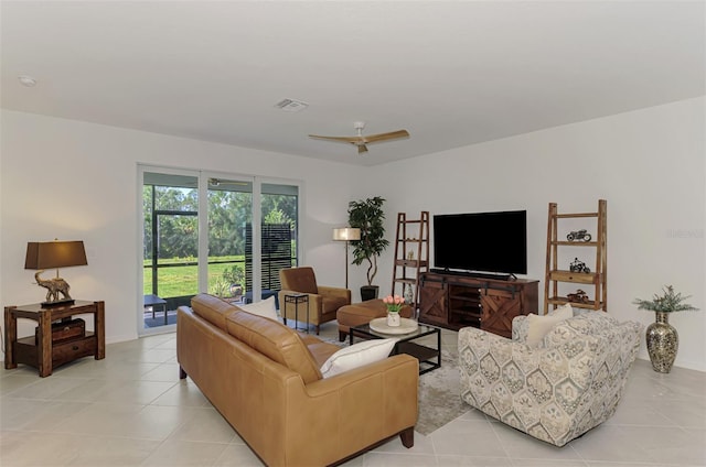 10995 Pinot Dr, Venice, FL 34293 - living area with visible vents, baseboards, and light tile patterned flooring