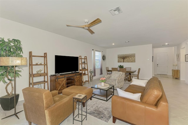 10995 Pinot Dr, Venice, FL 34293 - living room featuring a ceiling fan, recessed lighting, visible vents, and light tile patterned flooring