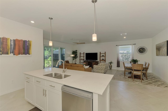 10995 Pinot Dr, Venice, FL 34293 - kitchen featuring pendant lighting, dishwasher, a sink, open floor plan, and light countertops