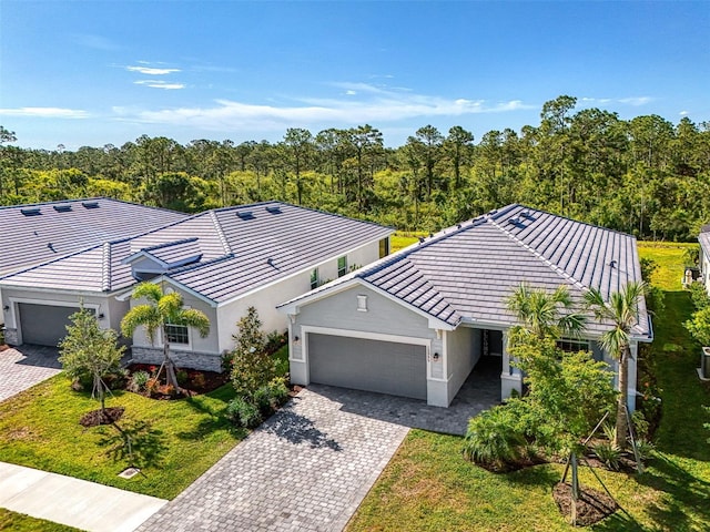 10995 Pinot Dr, Venice, FL 34293 - drone / aerial view featuring a wooded view