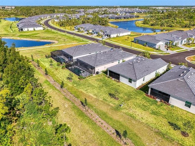 10995 Pinot Dr, Venice, FL 34293 - birds eye view of property featuring a water view and a residential view