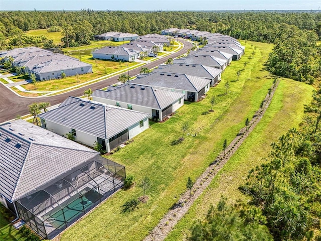 10995 Pinot Dr, Venice, FL 34293 - birds eye view of property featuring a forest view and a residential view