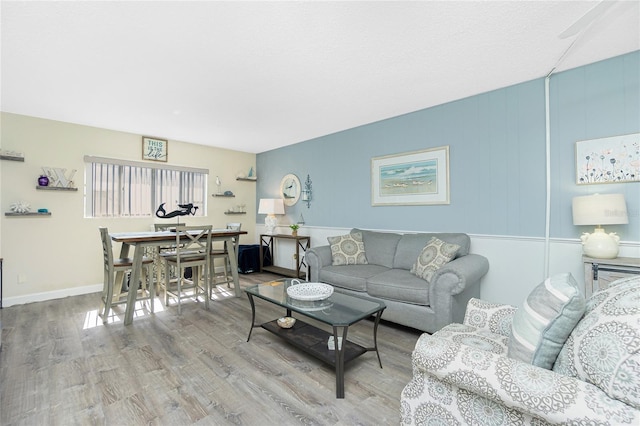 22375 Edgewater Dr Unit 123, Punta Gorda, FL 33980 - living area featuring baseboards and wood finished floors