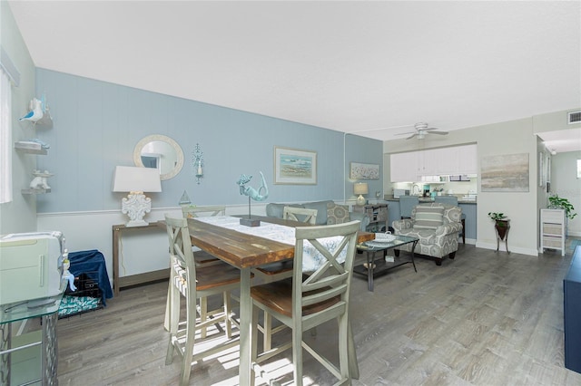 22375 Edgewater Dr Unit 123, Punta Gorda, FL 33980 - dining area with ceiling fan, light wood-style flooring, and visible vents